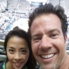 My friend, Janice, and me at a Mavericks game