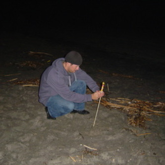 Lighting off bottle rockets one night after diving